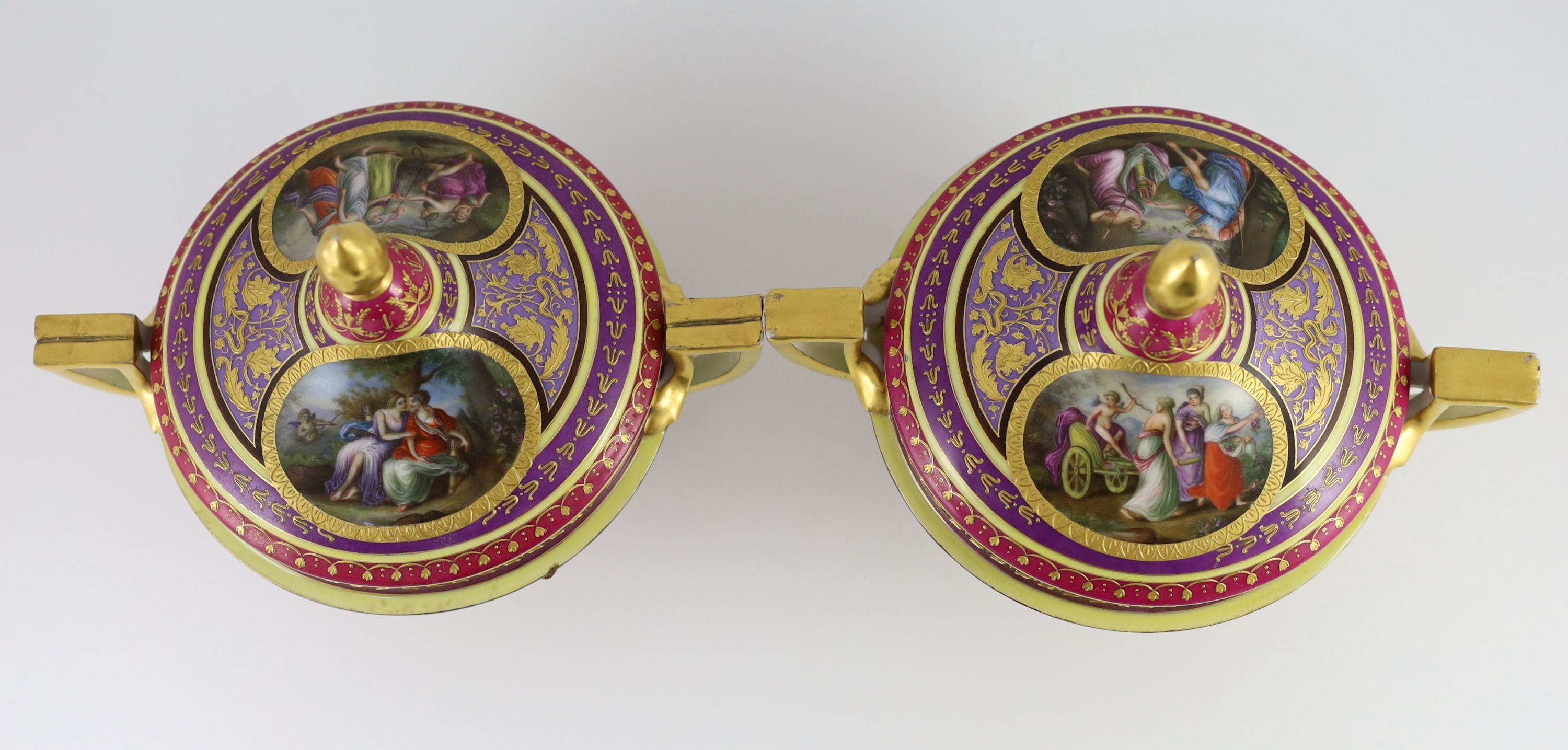 A pair of Vienna style porcelain ecuelles, covers and stands, c.1900, diameter 23.5cm